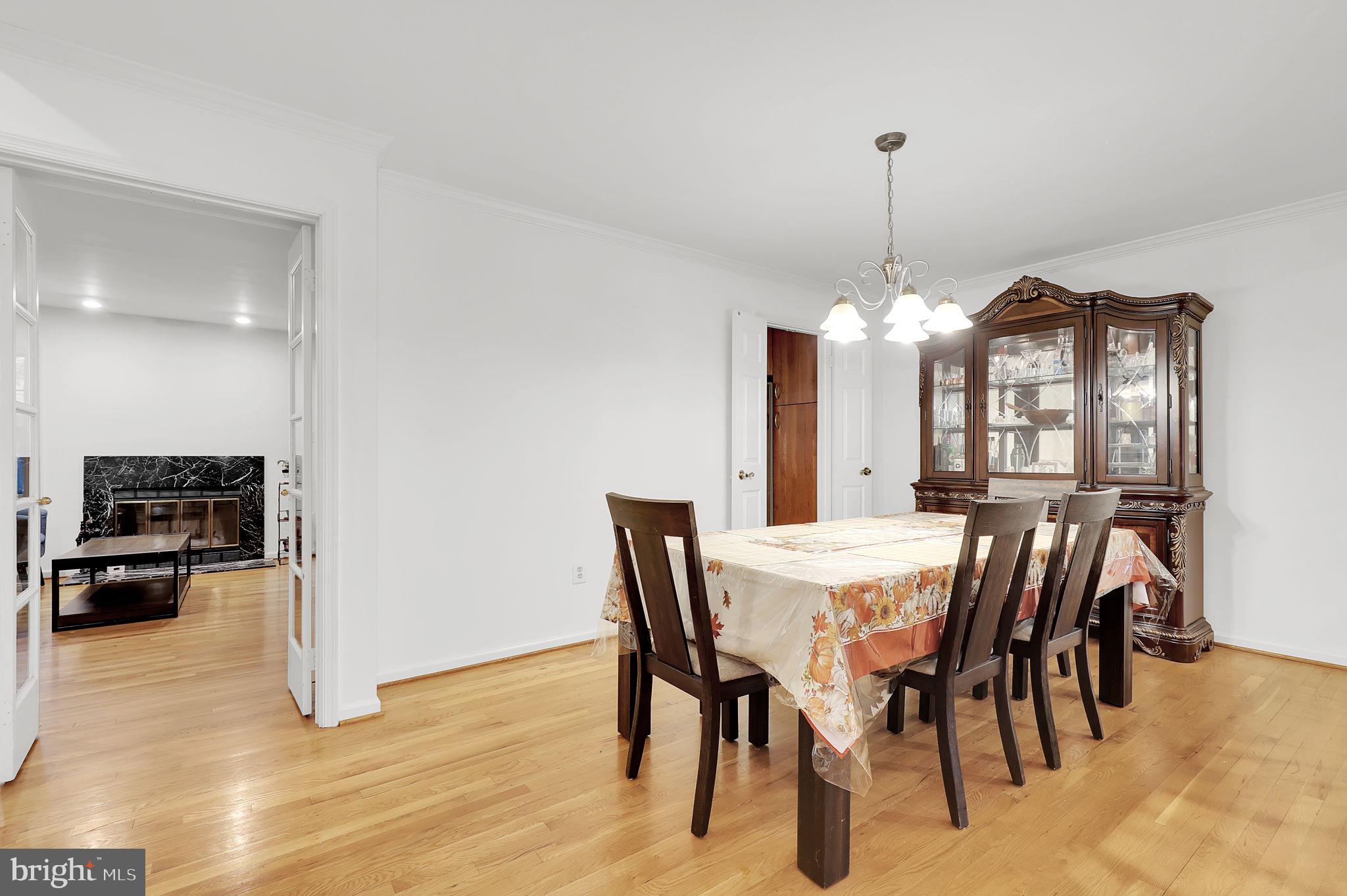 10804 Brewer House Road Rockville, MD 20852 - Photo 7 of 39 a view of a dining room with furniture