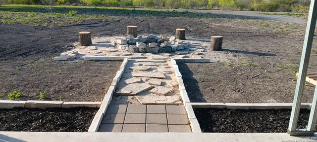 a view of outdoor space with seating area
