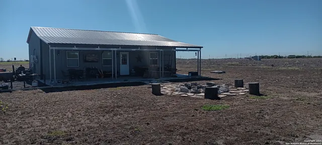 a view of a two chair in the patio