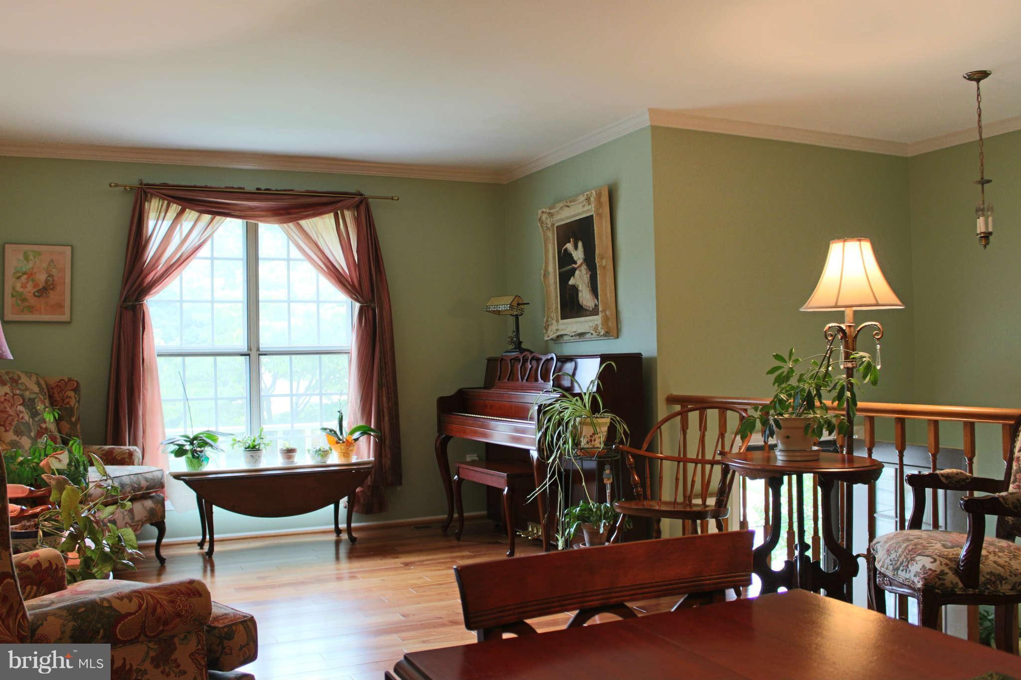 5965 Powell's Landing Road Burke, VA 22015 - Photo 3 of 15 Bright and spacious living