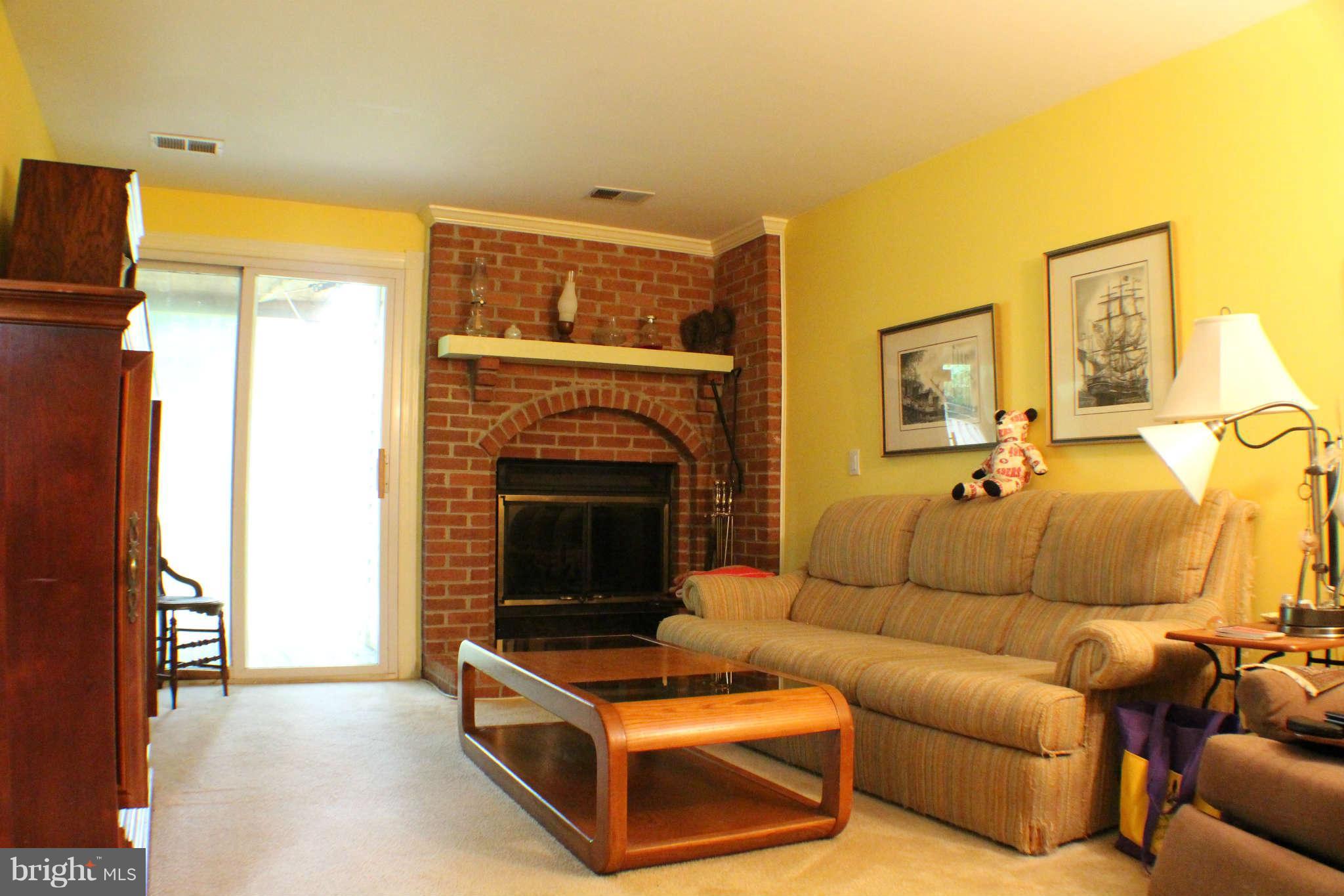 5965 Powell's Landing Road Burke, VA 22015 - Photo 8 of 15 Family Room with fireplace and access to back yard