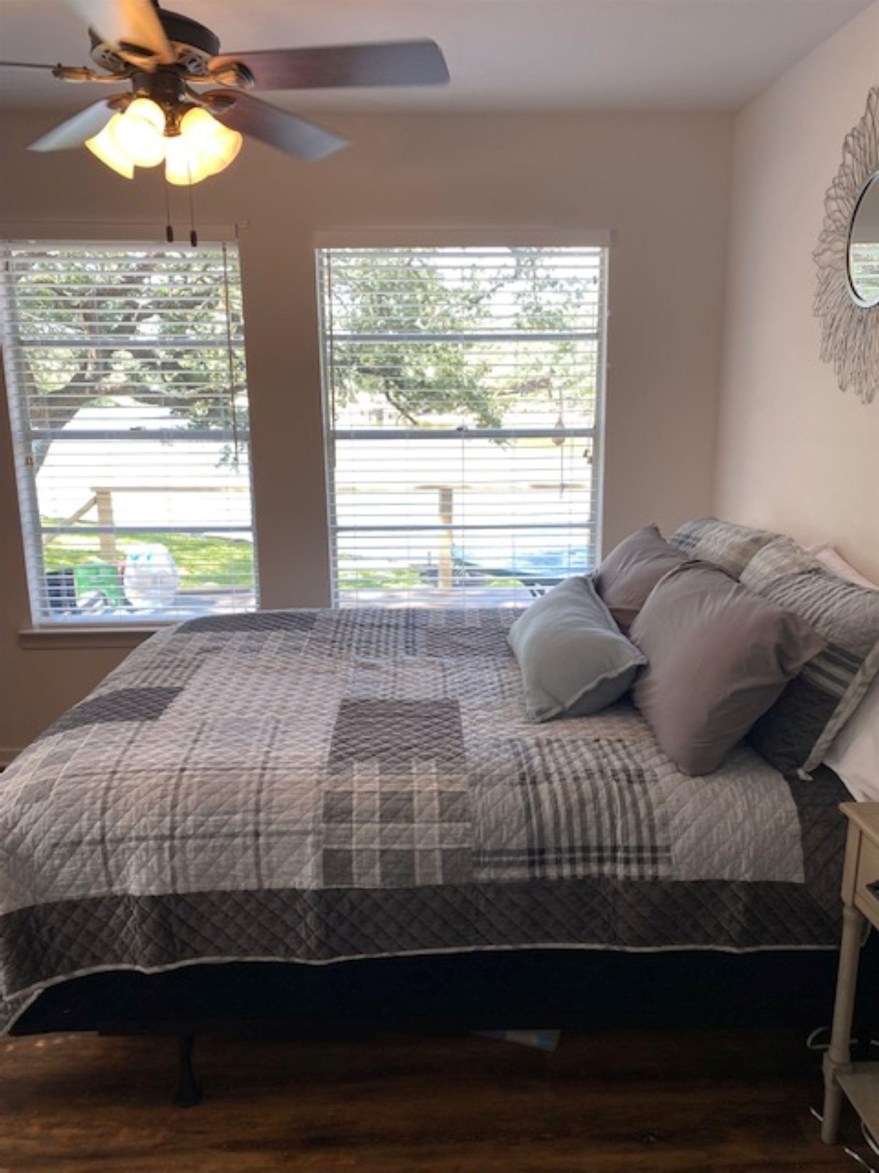 602 Sycamore Road Burnet, TX 78611 - Photo 18 of 26 a bedroom with a bed and a window