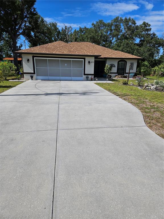 277 Albatross Road Rotonda West, FL 33947 - Photo 1 of 3 a house with outdoor space