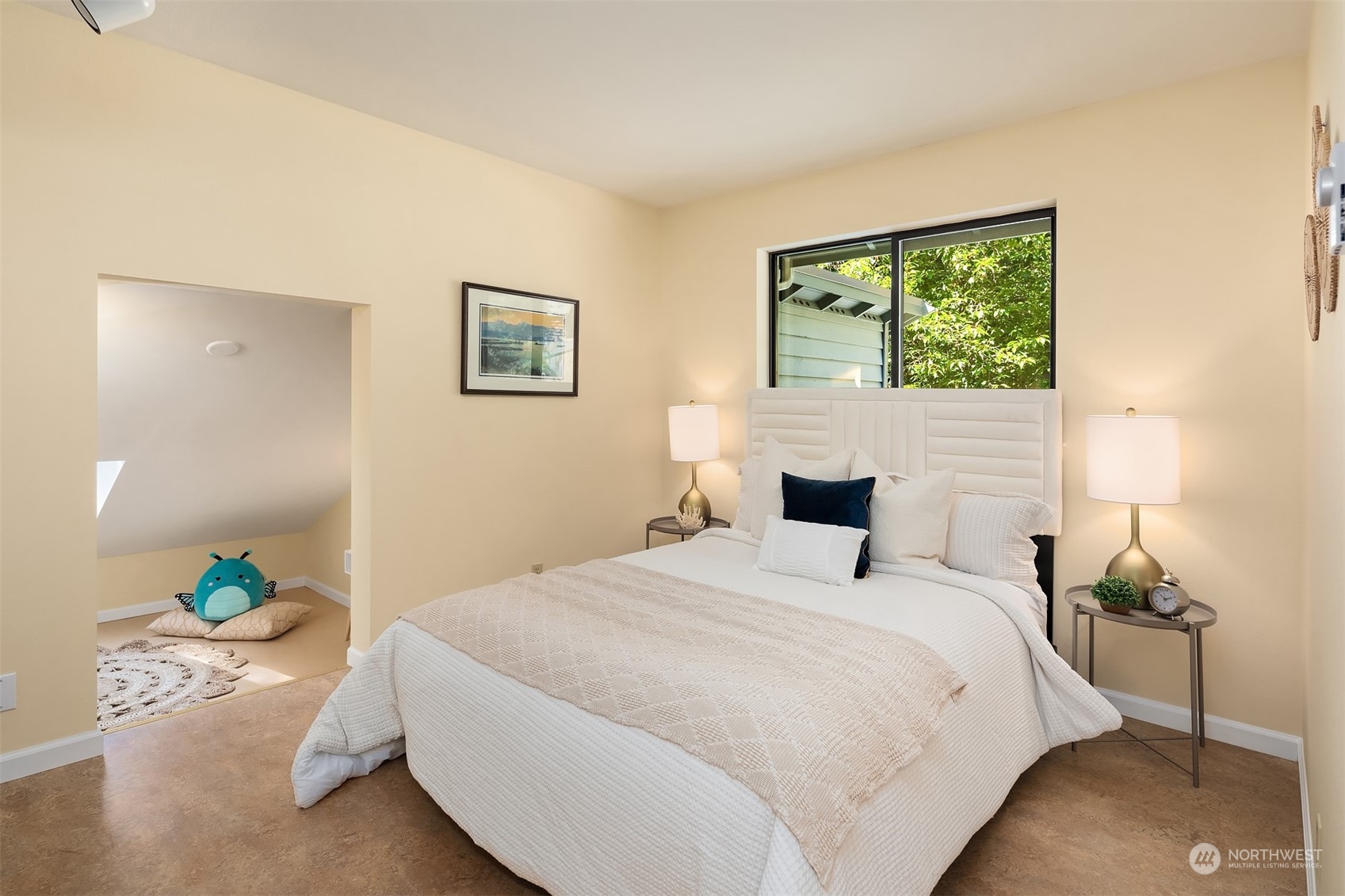 21127 Shell Valley Road Edmonds, WA 98026 - Photo 18 of 40 a bedroom with a bed and a window