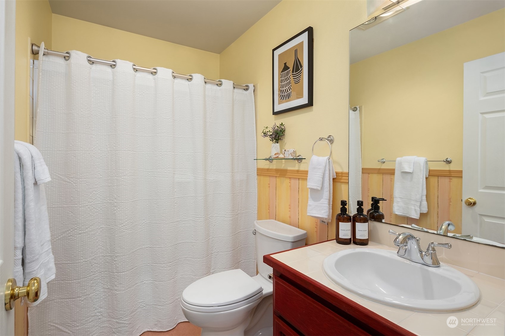 21127 Shell Valley Road Edmonds, WA 98026 - Photo 20 of 40 a bathroom with a sink toilet and shower