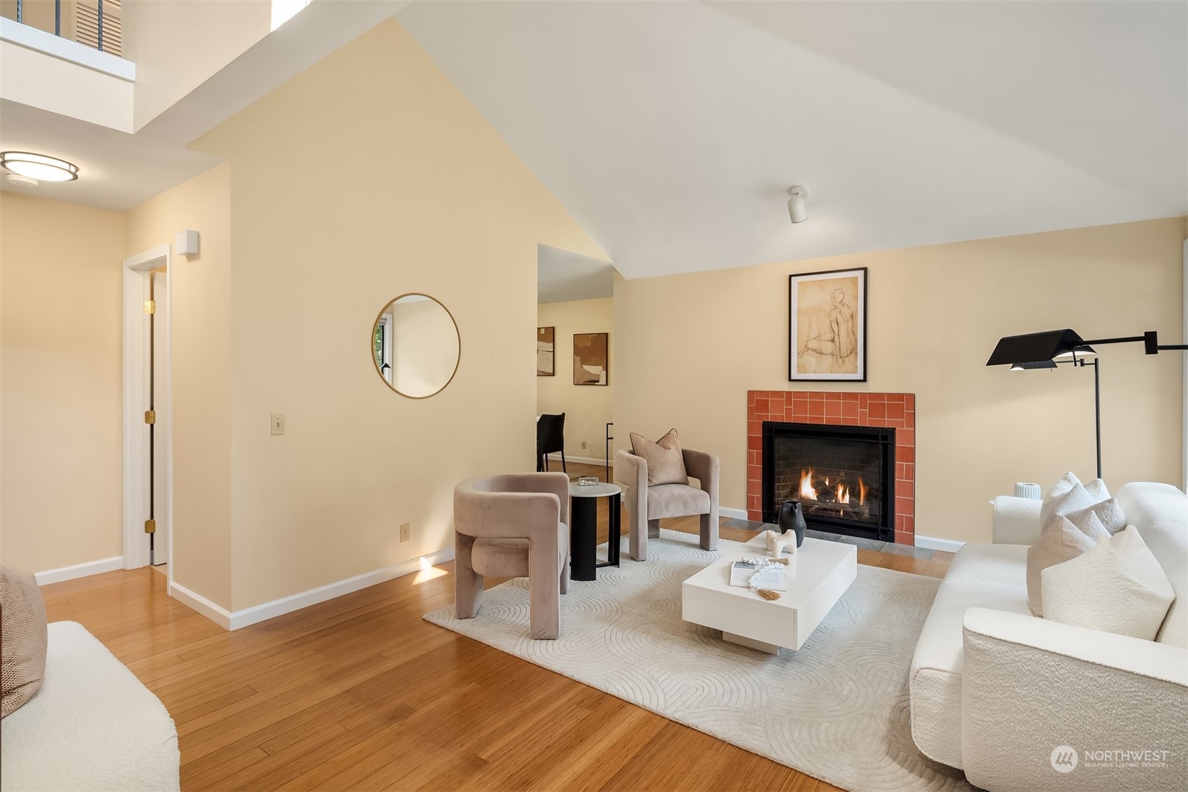 21127 Shell Valley Road Edmonds, WA 98026 - Photo 2 of 40 a living room with furniture and a fireplace