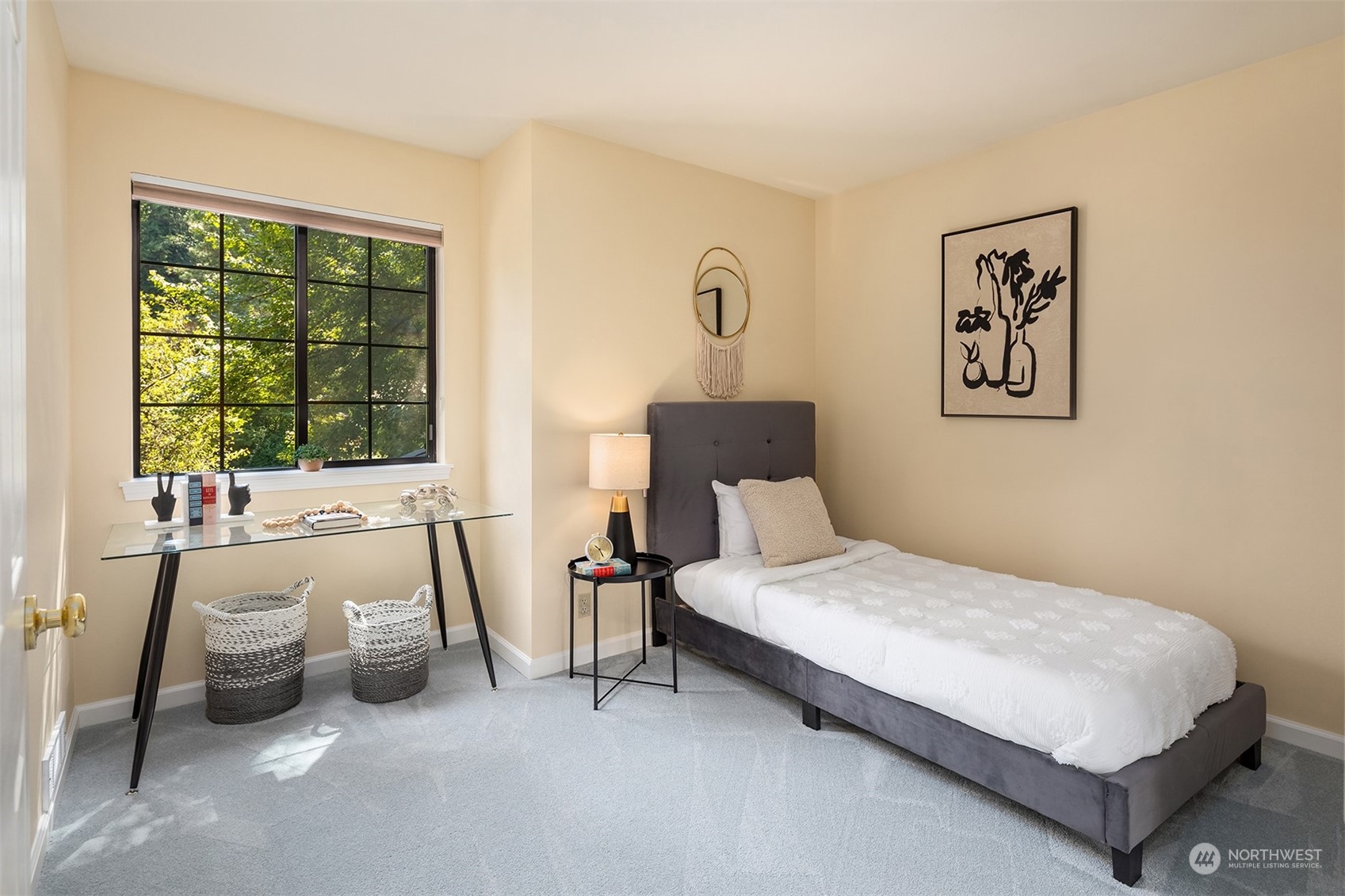 21127 Shell Valley Road Edmonds, WA 98026 - Photo 21 of 40 a bedroom with a bed and a large window