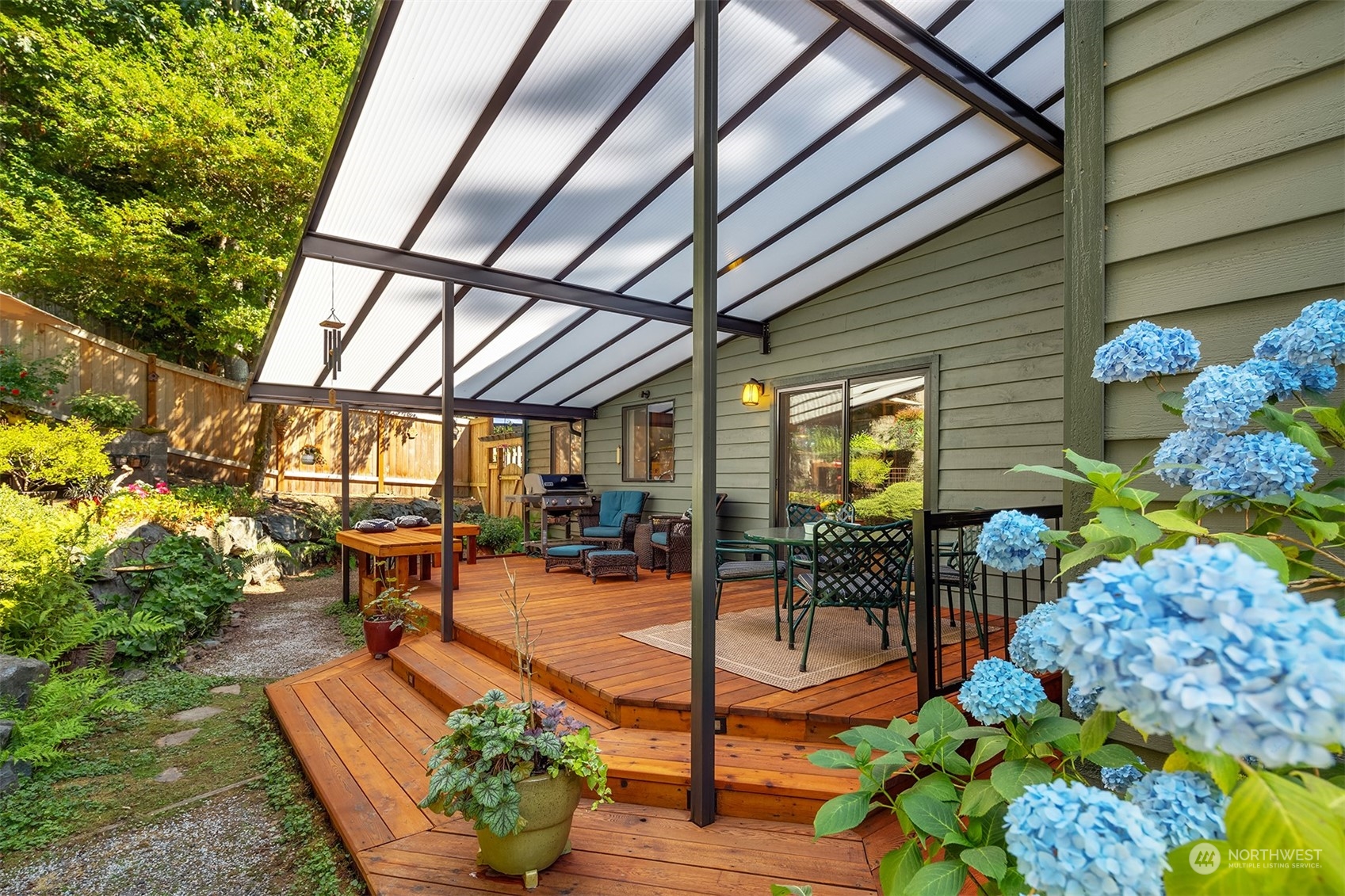 21127 Shell Valley Road Edmonds, WA 98026 - Photo 28 of 40 a outdoor living space with furniture and garden view