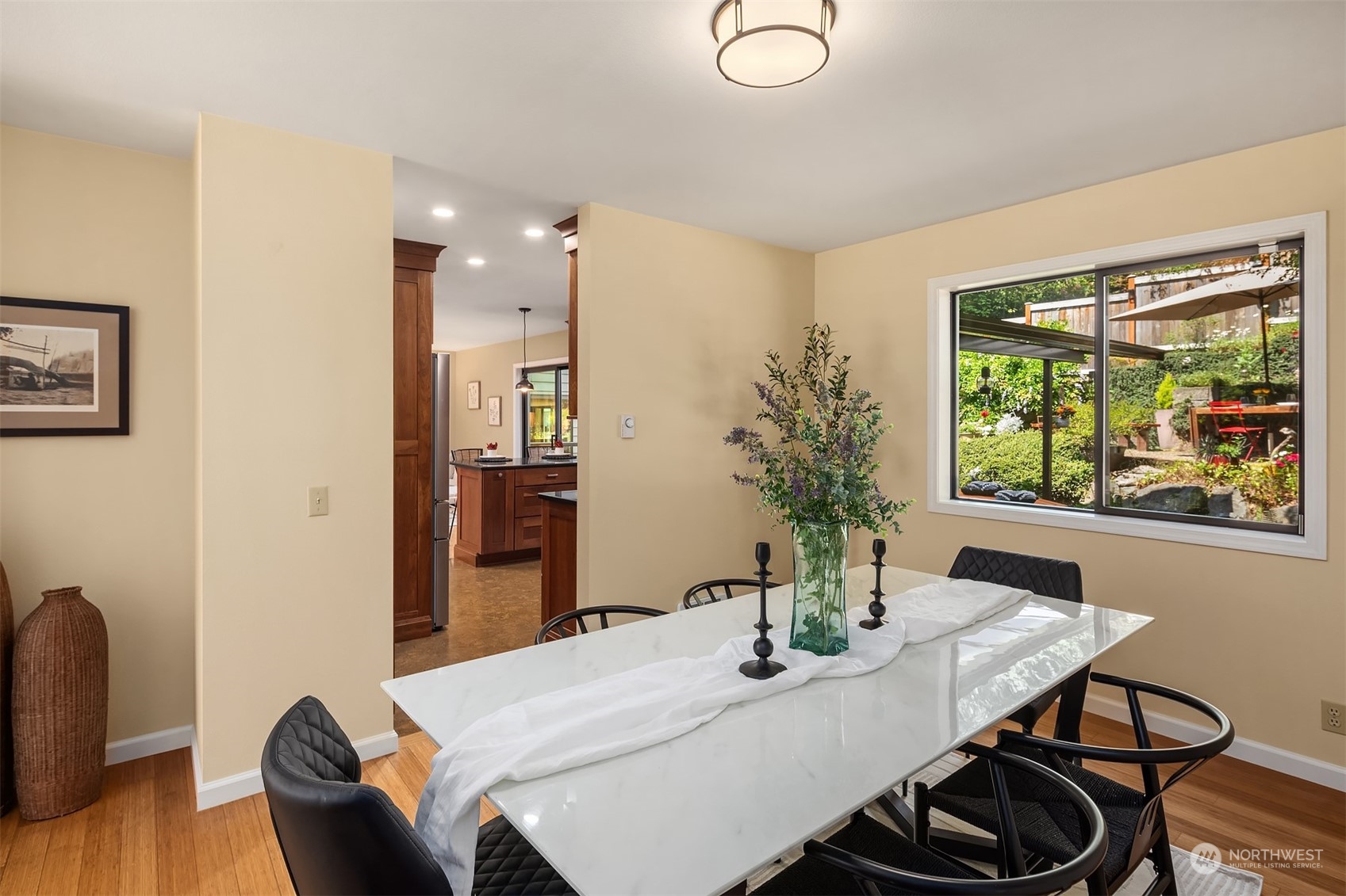 21127 Shell Valley Road Edmonds, WA 98026 - Photo 5 of 40 a view of a dining room with furniture window and wooden floor