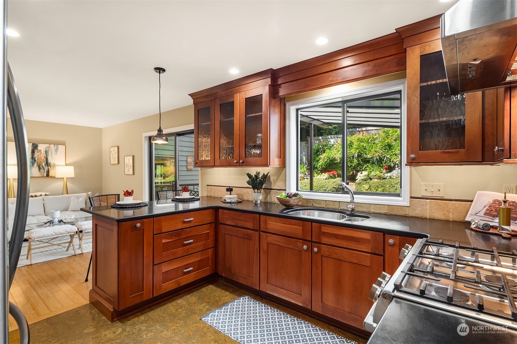 21127 Shell Valley Road Edmonds, WA 98026 - Photo 7 of 40 a kitchen with sink cabinets and window