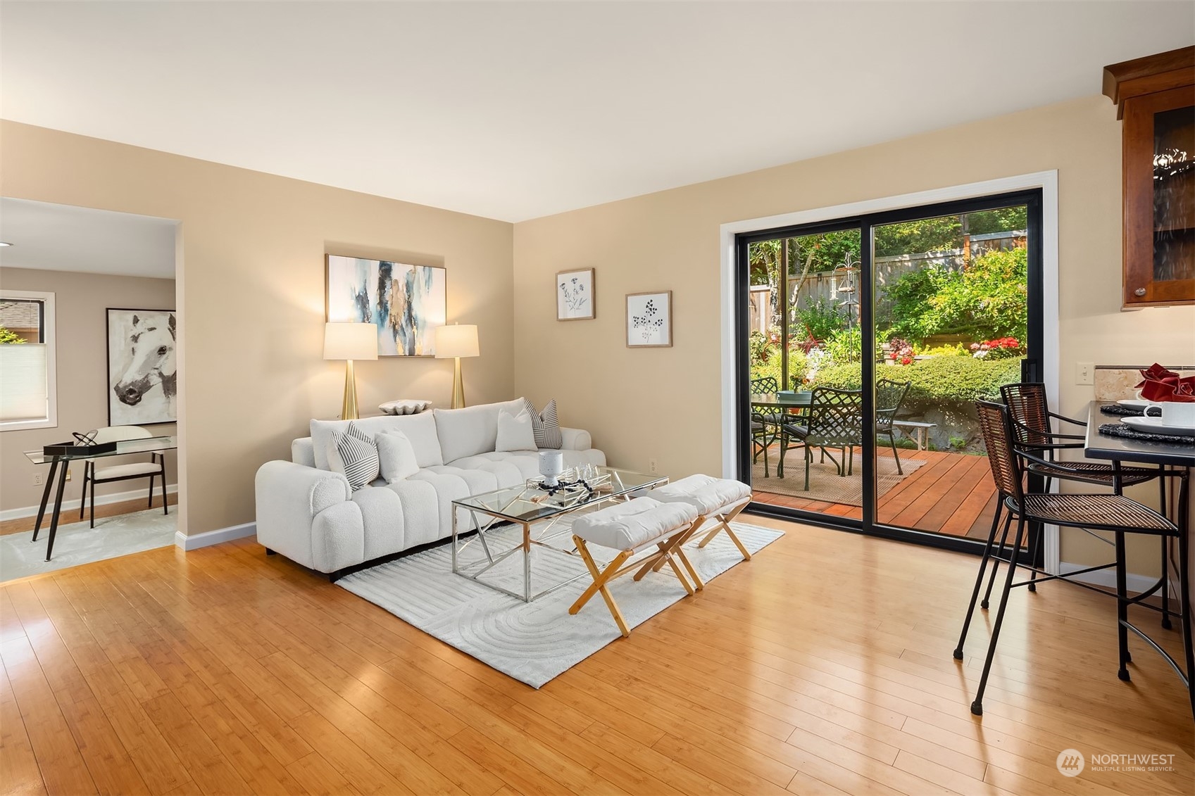 21127 Shell Valley Road Edmonds, WA 98026 - Photo 10 of 40 a living room with furniture and a large window with wooden floor