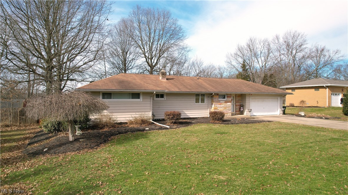 4061 Marks Rootstown, OH 44272 - Photo 2 of 25 Single story home featuring a front lawn and a garage
