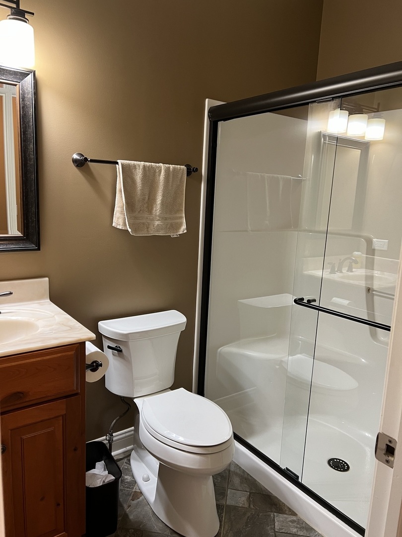 3281 East 19th Road Ottawa, IL 61350 - Photo 9 of 37 a white toilet sitting next to a bathroom sink