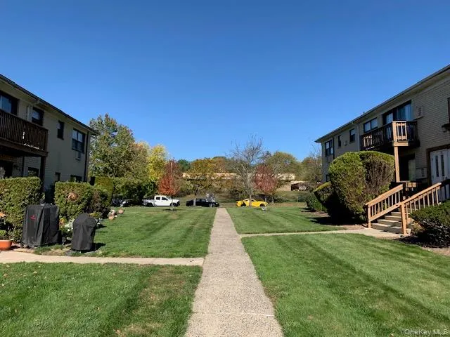 a view of a garden with a houses