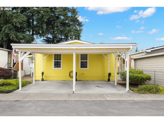 a front view of a house with a outdoor space