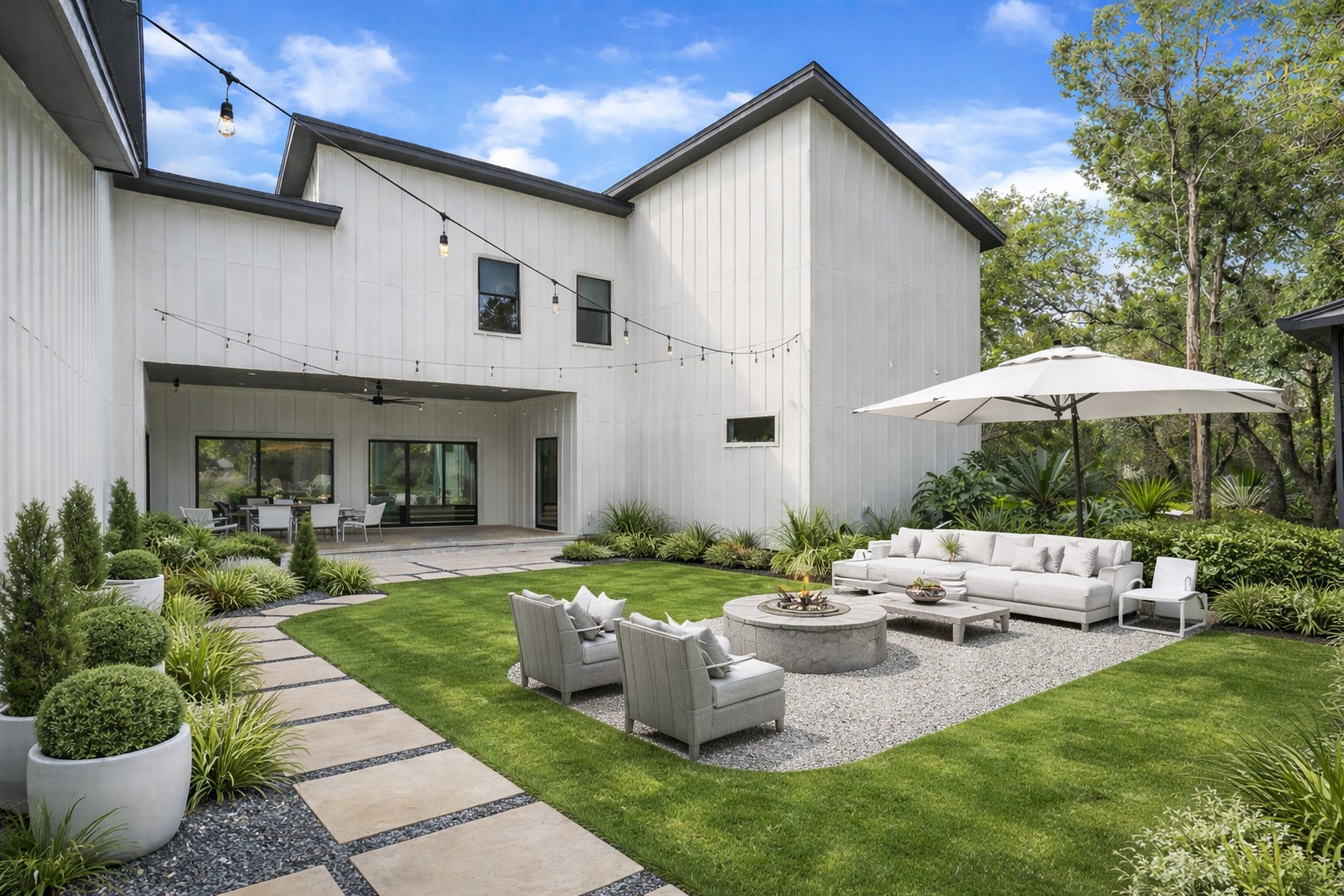 16001 Pool Canyon Road Austin, TX 78734 - Photo 29 of 31 Rear view of house featuring a patio area, outdoor furniture, a ceiling fan, and a yard