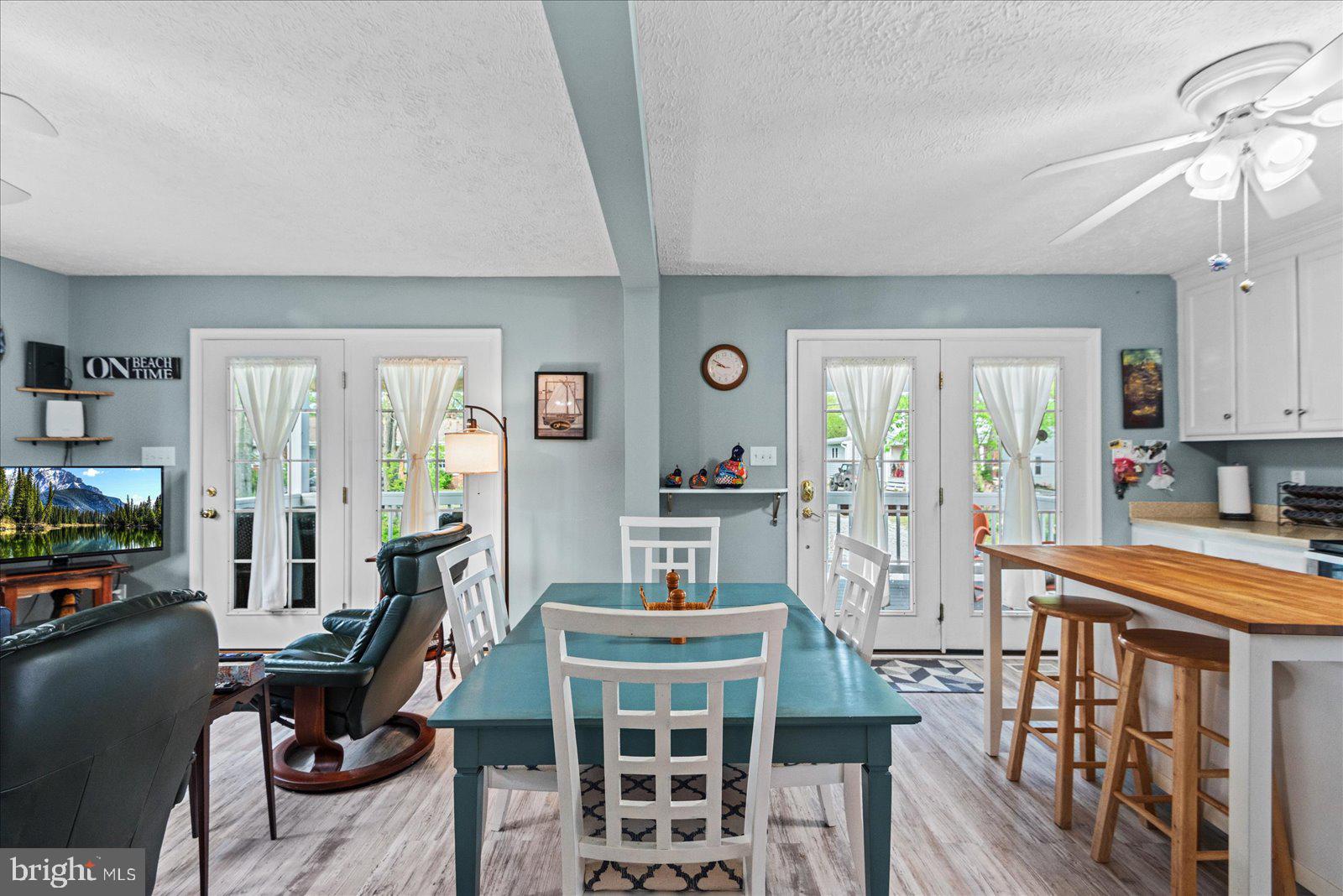 720 Bancroft Avenue Colonial Beach, VA 22443 - Photo 14 of 59 a view of a livingroom with furniture window and a view of kitchen