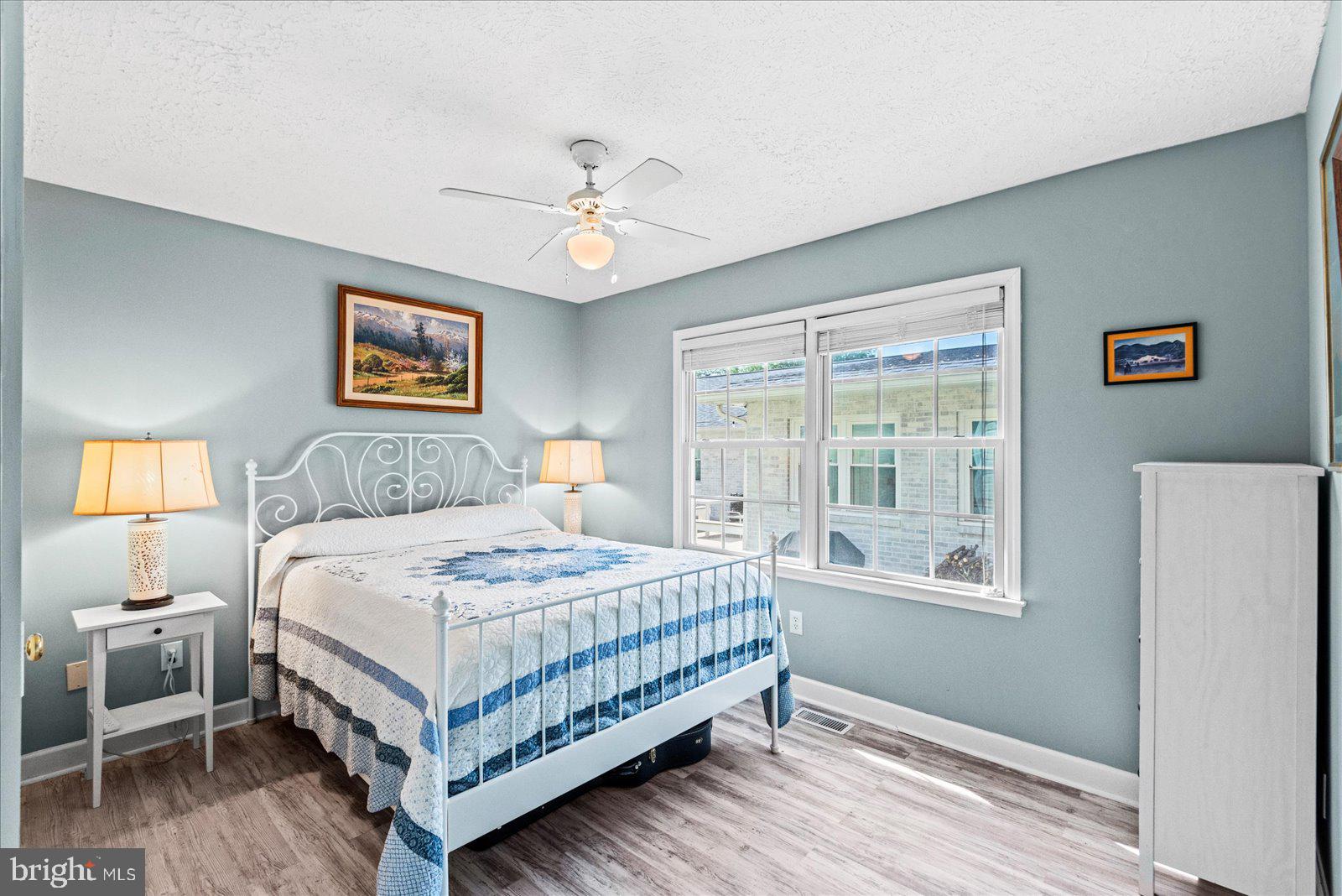 720 Bancroft Avenue Colonial Beach, VA 22443 - Photo 20 of 59 a bedroom with a bed and a window