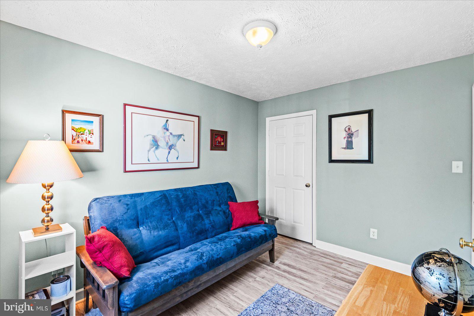 720 Bancroft Avenue Colonial Beach, VA 22443 - Photo 23 of 59 a living room with furniture and a couch