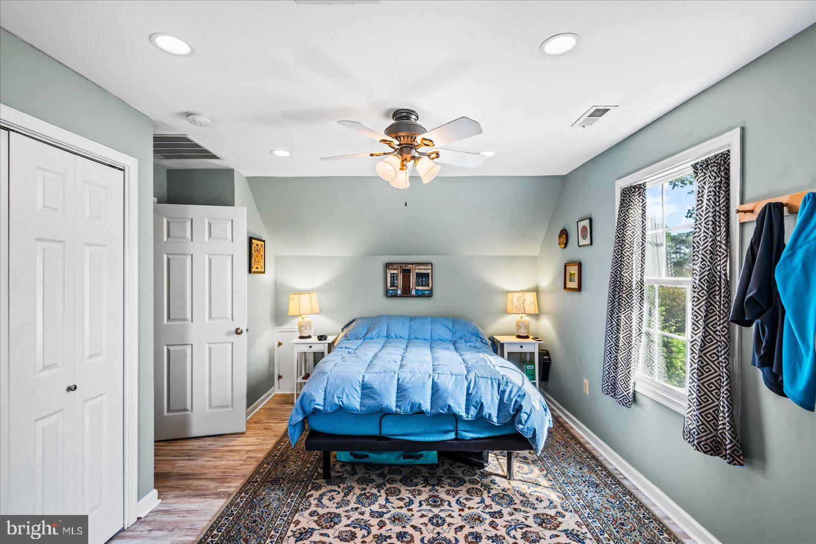 720 Bancroft Avenue Colonial Beach, VA 22443 - Photo 28 of 59 a living room with furniture and a chandelier