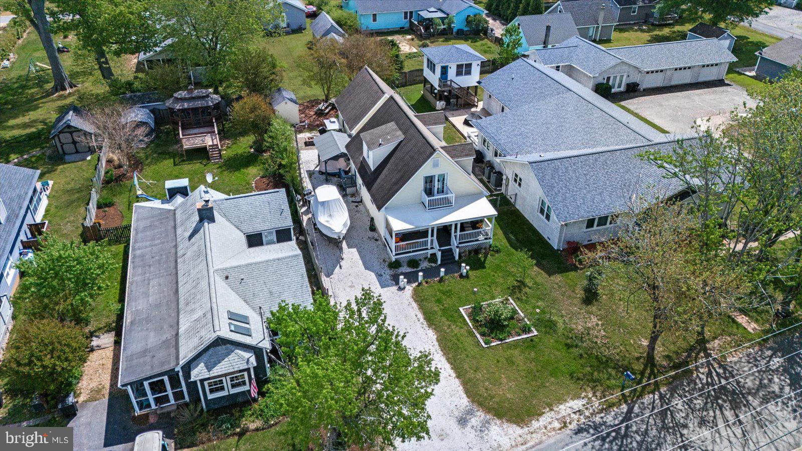 720 Bancroft Avenue Colonial Beach, VA 22443 - Photo 50 of 59 an aerial view of multiple houses with yard
