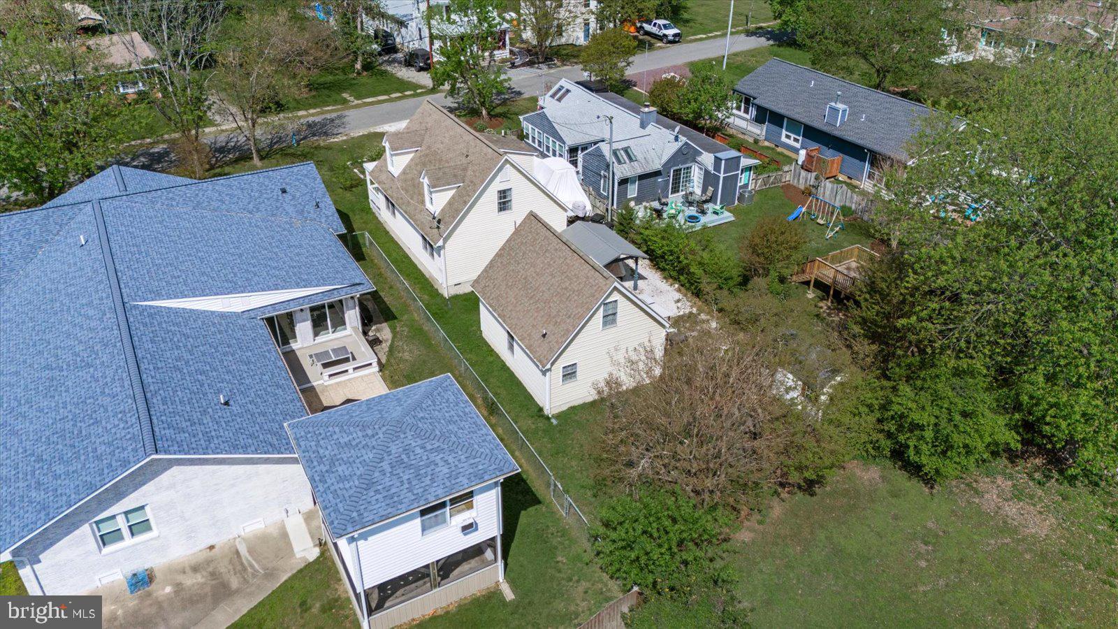 720 Bancroft Avenue Colonial Beach, VA 22443 - Photo 53 of 59 an aerial view of a house with a yard