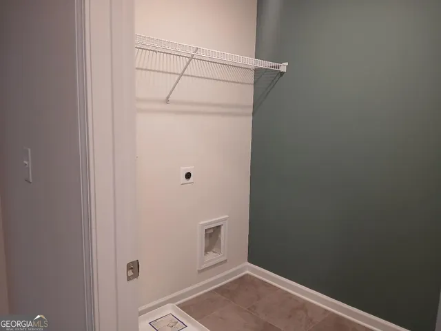 a view of a hallway with closet