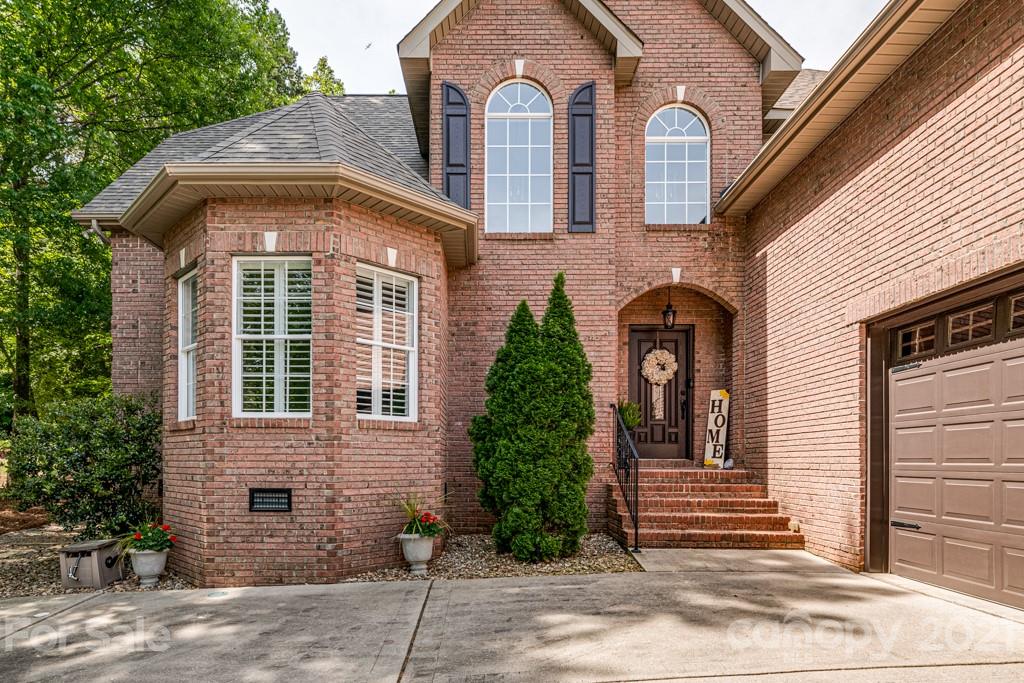 4367 Lake Shore Road North Denver, NC 28037 - Photo 3 of 48 a front view of a house
