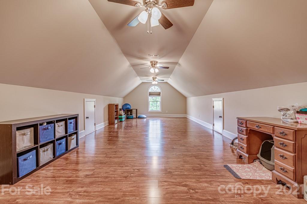 4367 Lake Shore Road North Denver, NC 28037 - Photo 32 of 48 a view of livingroom with hardwood floor and a ceiling fan