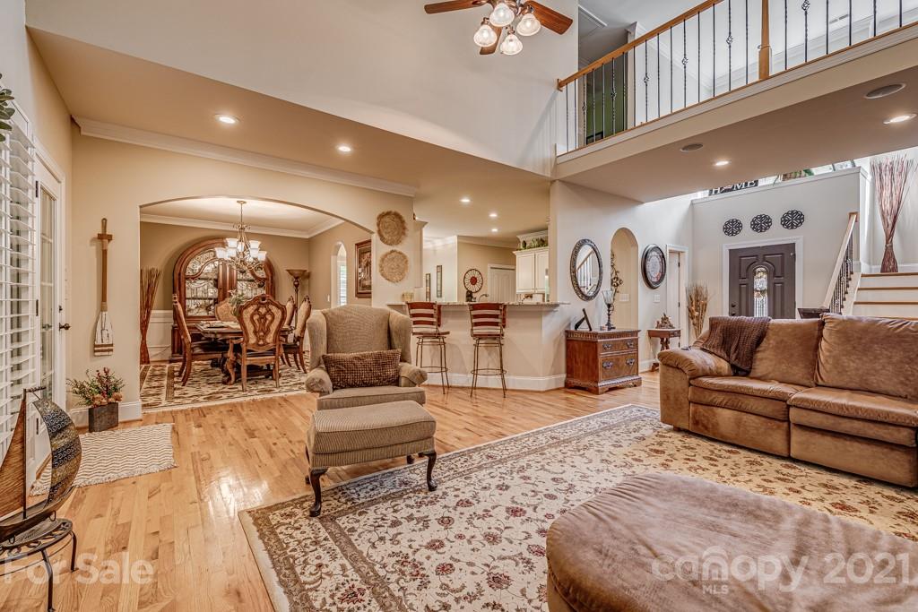 4367 Lake Shore Road North Denver, NC 28037 - Photo 10 of 48 a living room with furniture and wooden floor