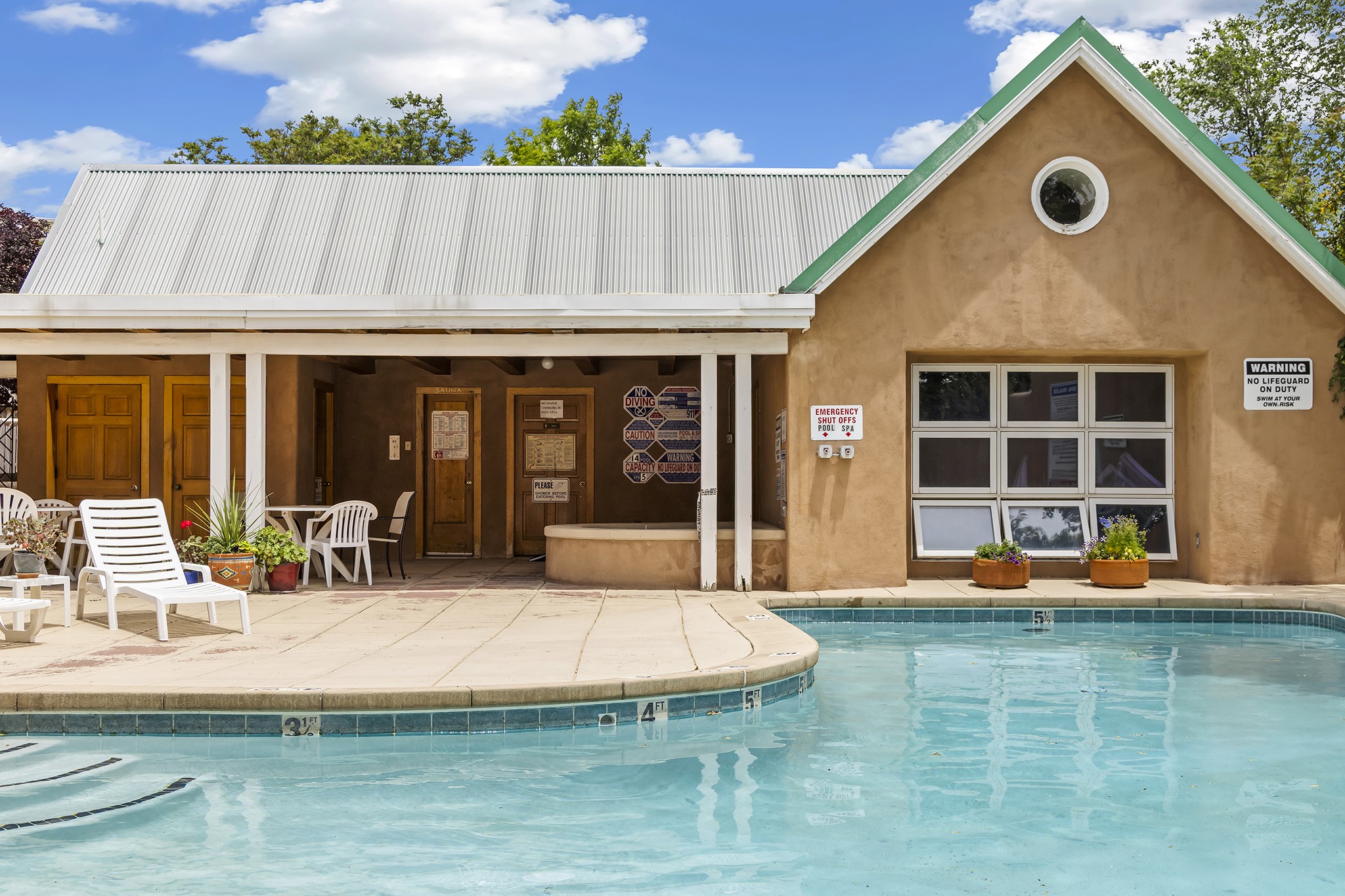501 Rio Grande Avenue, Unit A7 Santa Fe, NM 87501 - Photo 25 of 28 Community clubhouse with hot tub