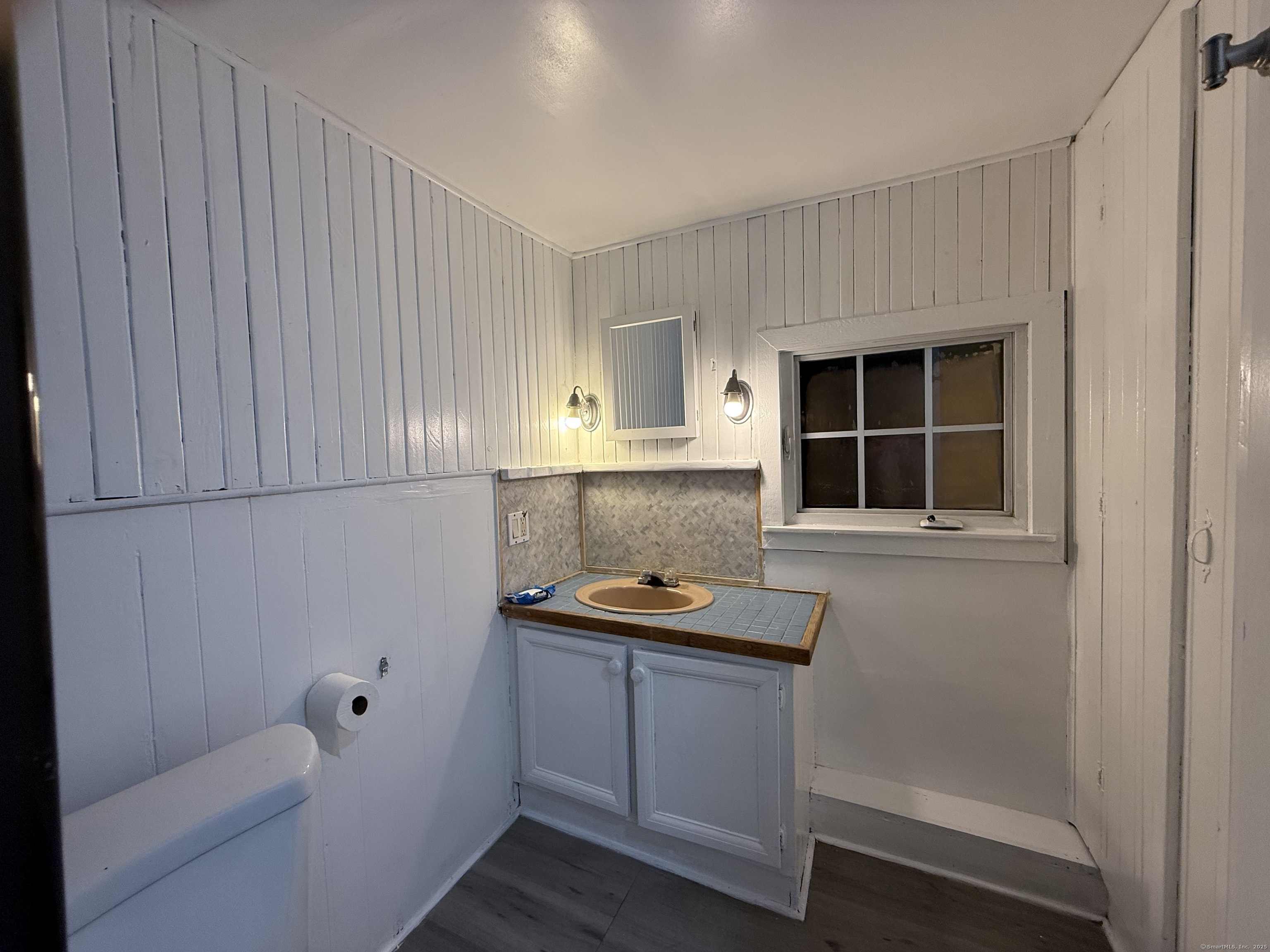 243 Champion Road Franklin, CT 06254 - Photo 13 of 13 a bathroom with a sink and a toilet