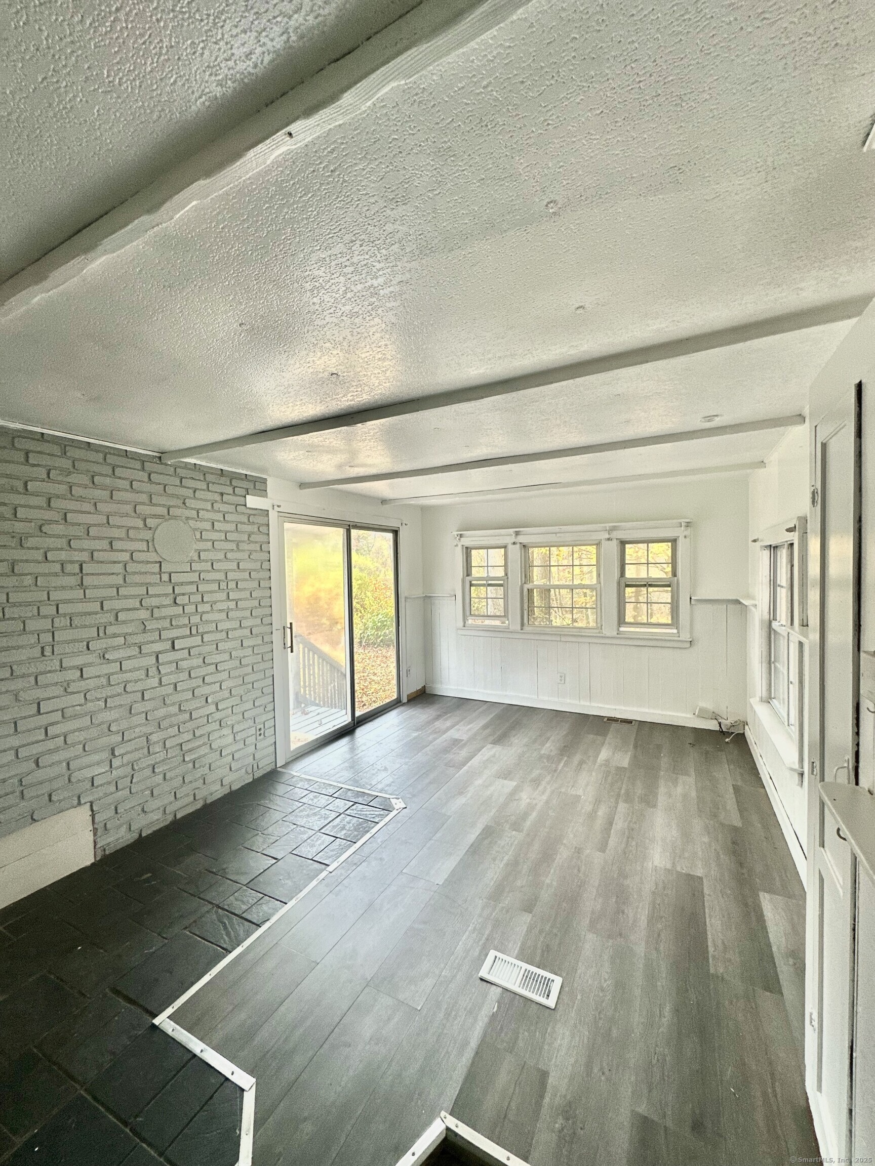 243 Champion Road Franklin, CT 06254 - Photo 7 of 13 a view of an empty room and window