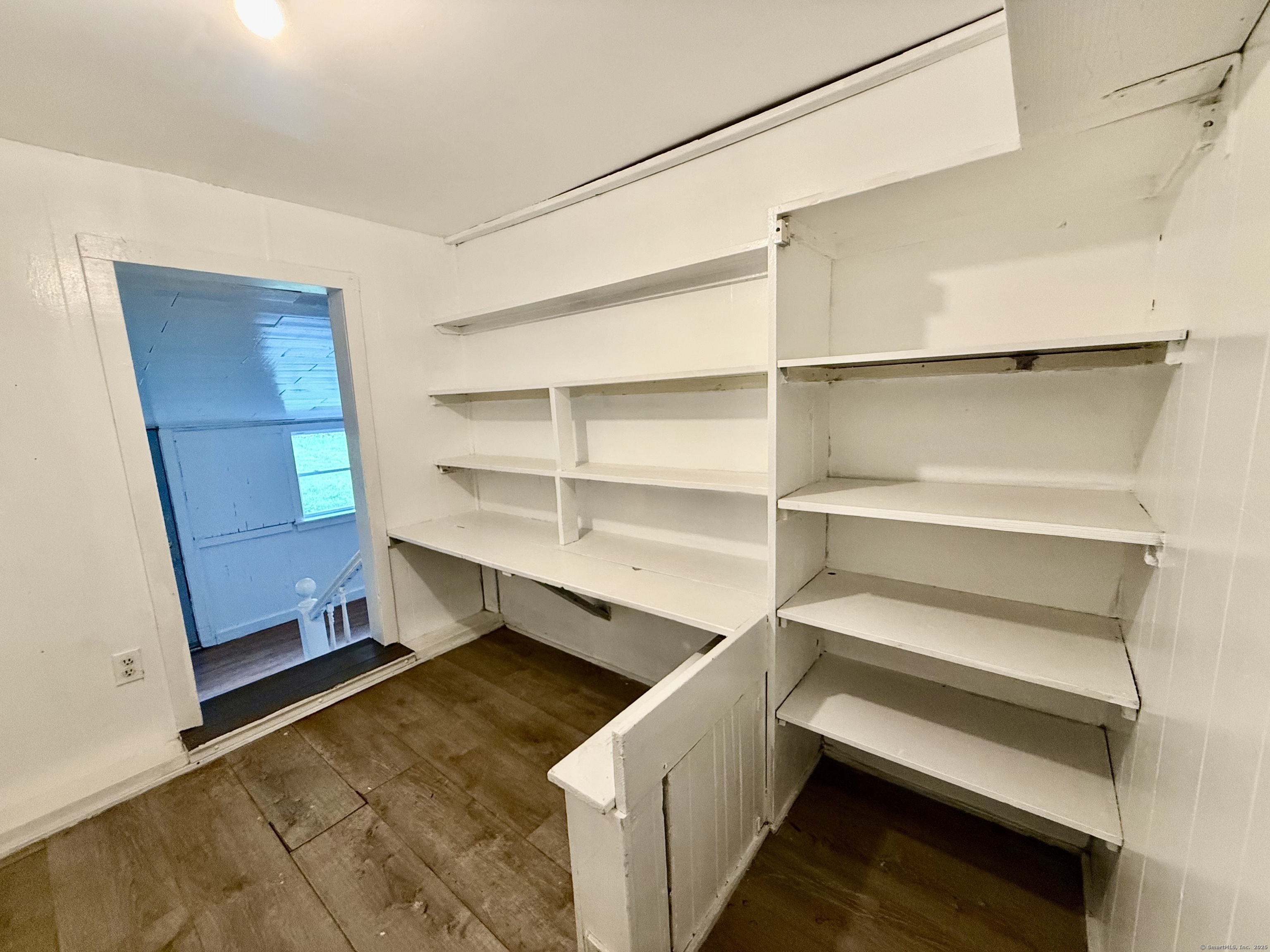 243 Champion Road Franklin, CT 06254 - Photo 9 of 13 a view of walk in closet with empty racks