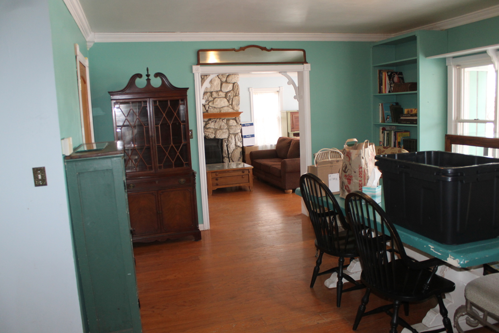 16038 Quigley Road Sycamore, IL 60178 - Photo 11 of 42 a view of a dining room with furniture window and wooden floor