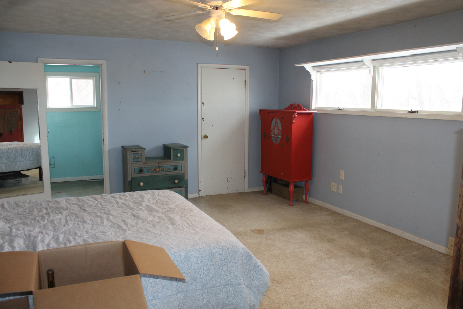 16038 Quigley Road Sycamore, IL 60178 - Photo 13 of 42 a bedroom with a bed and window