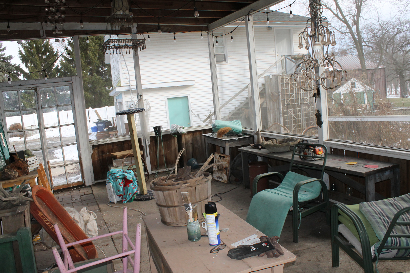 16038 Quigley Road Sycamore, IL 60178 - Photo 35 of 42 a view of a patio with a dining table and chairs