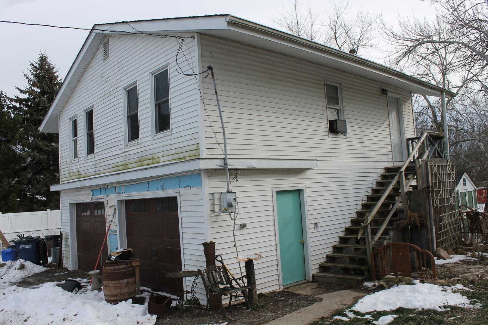 16038 Quigley Road Sycamore, IL 60178 - Photo 37 of 42 a front view of a house with garage