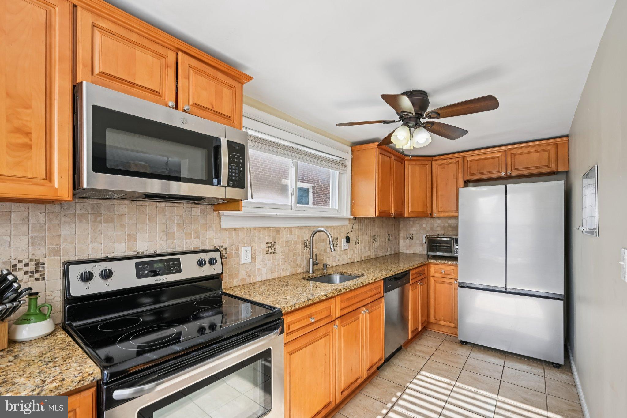 236 Cambridge Road Clifton Heights, PA 19018 - Photo 14 of 39 Granite counters and stainless steel appliances