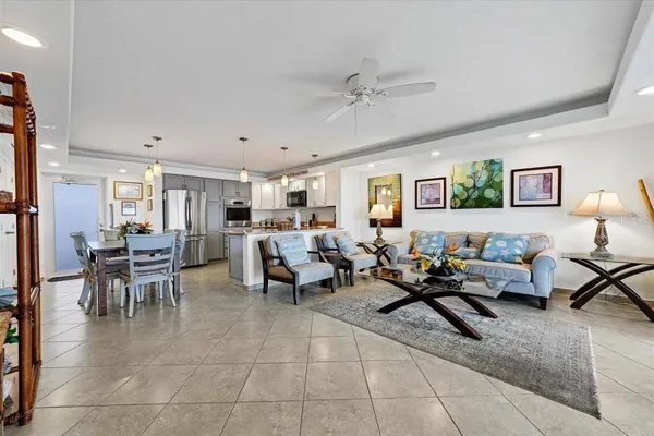 a living room with lots of furniture and a window