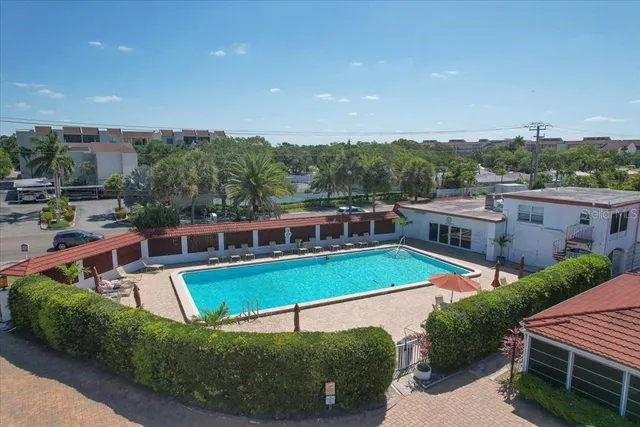 an aerial view of a house with a garden
