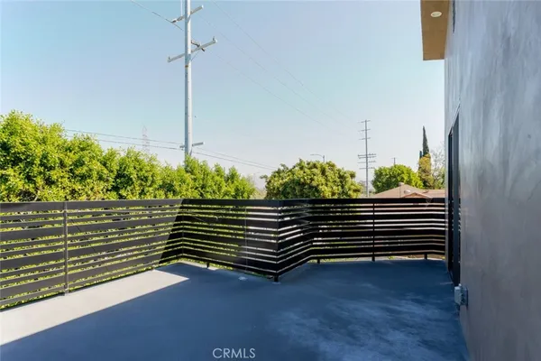 a view of a backyard with plants