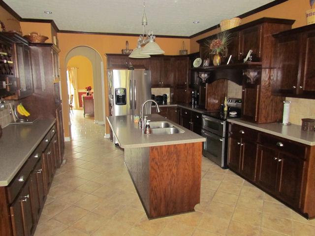 1417 Peyton Road Lebanon, TN 37087 - Photo 4 of 20 The huge kitchen has tile flooring, a smooth top stove with double ovens, a dishwasher and a pantry.