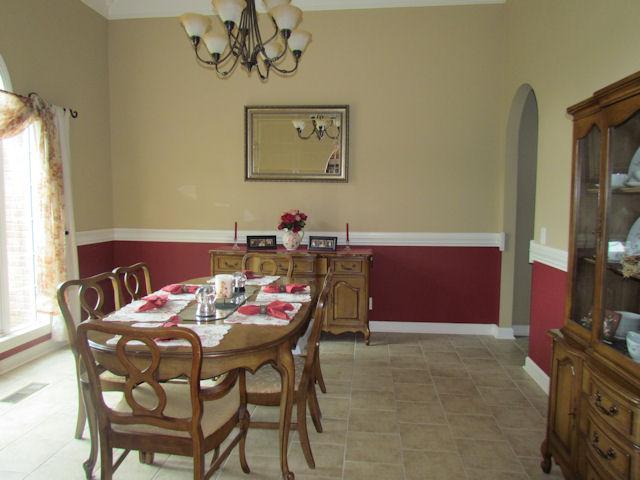 1417 Peyton Road Lebanon, TN 37087 - Photo 6 of 20 The fabulous formal dining room has tile flooring, chair rail and gorgeous crown moulding with a 12' ceiling