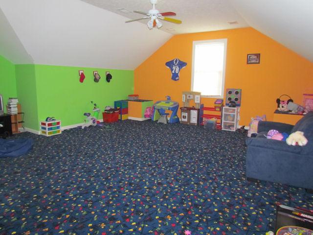 1417 Peyton Road Lebanon, TN 37087 - Photo 7 of 20 The adorable bonus room upstairs has carpet and a ceiling fan.