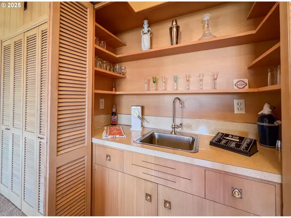 a kitchen with a cabinets and a stove