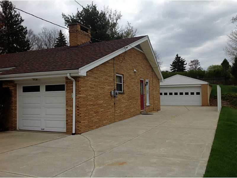 106 Tyler Road Pittsburgh, PA 15237 - Photo 15 of 21 Exterior Front. Side entrance has only one step to enter. Expansive, level concrete driveway
