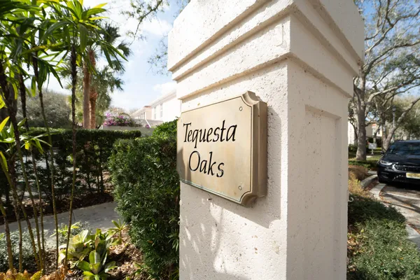 a sign that is on the side of a building