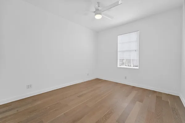 an empty room with a bathroom