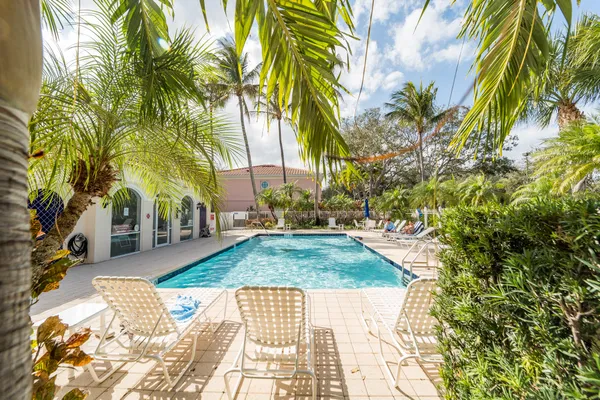 a view of a playground with basketball court